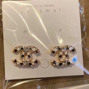 Studs earrings unbranded.